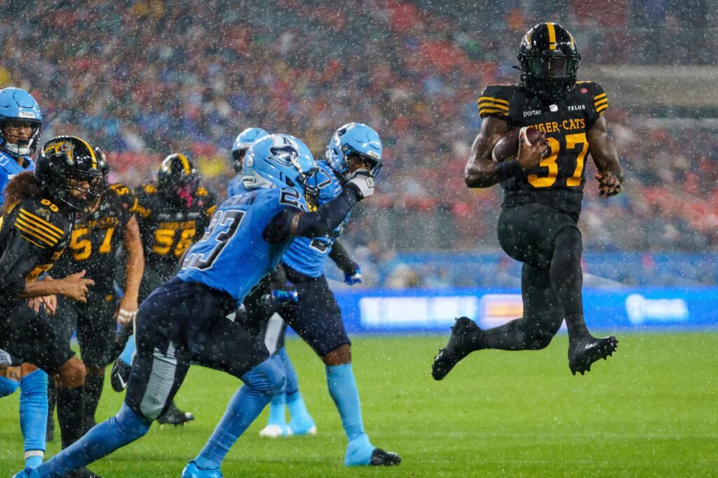 Chad Kelly throws three TD passes as Argos earn 39-20 wild weather win over Ticats
