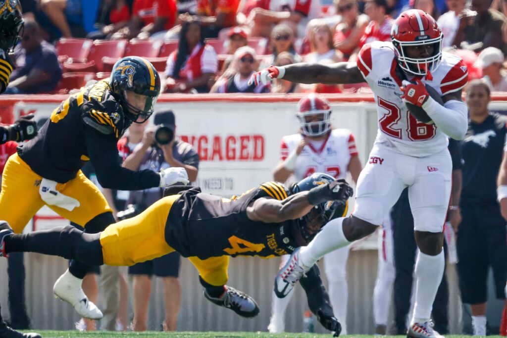 Dedrick Mills scores late touchdown, lifts Stampeders to 28-23 victory over Tiger-Cats