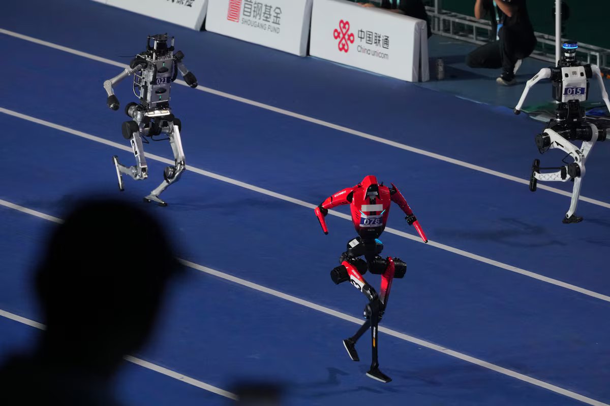 Human 100 m sprint and high-jump records beaten at Beijing’s robot games