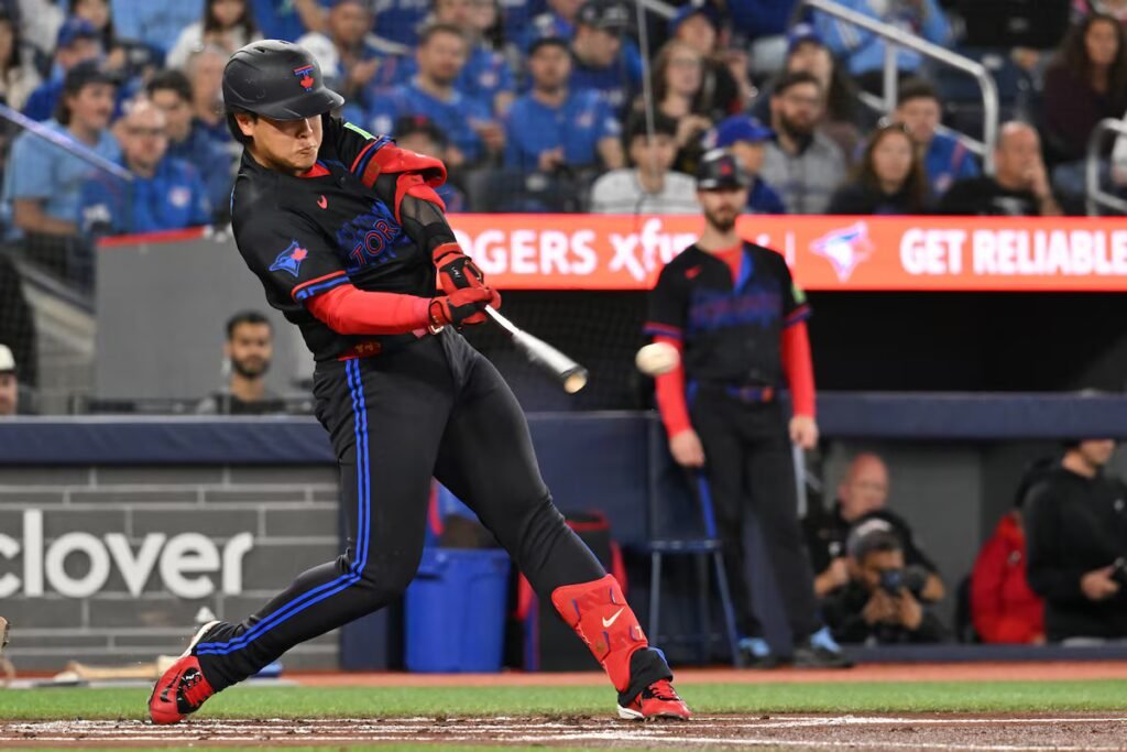 Okamoto powers Blue Jays past Reds 6-5